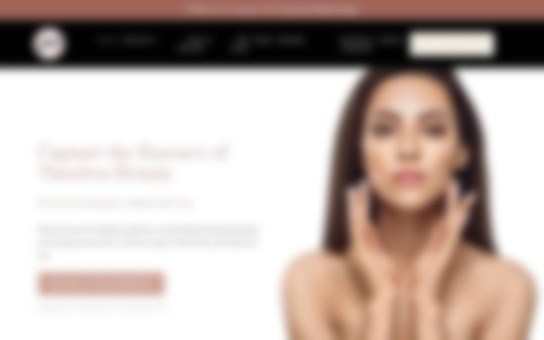 The current website, blurred for privacy